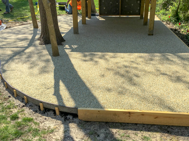 C and M Concrete_Rubaroc_Rubber Surface Install Playground